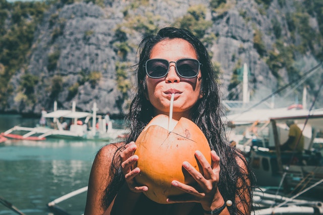 photo-of-girl-drinking-coconut-1753677