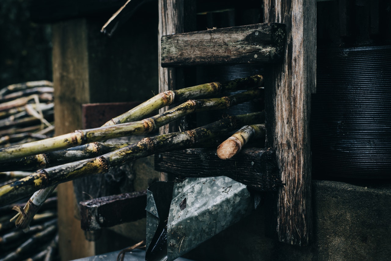 sugar-canes-being-pressed-in-the-machine-2254100